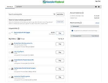 Mobile phone with banking information on screen.