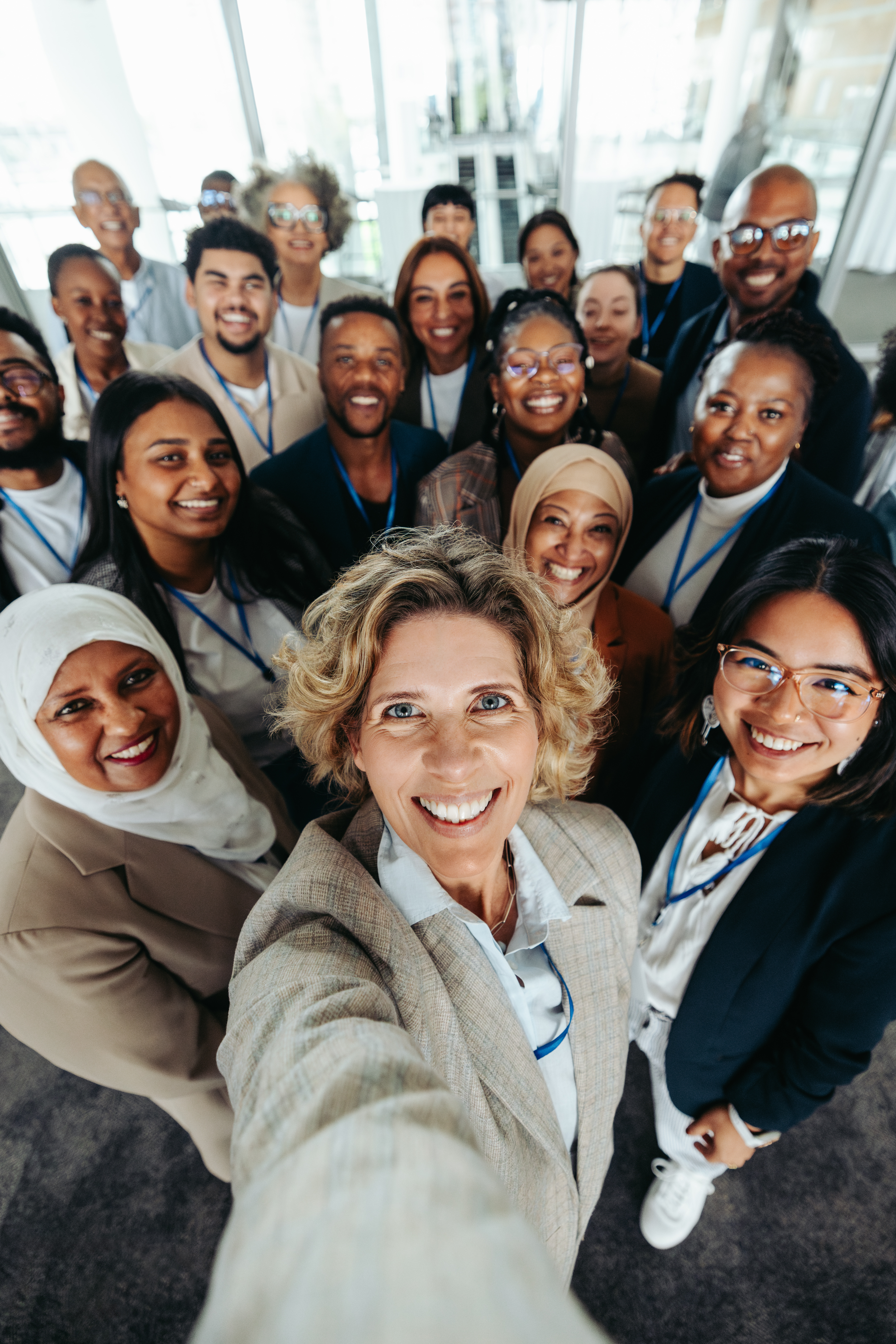 Diverse group of people taking a selfie.