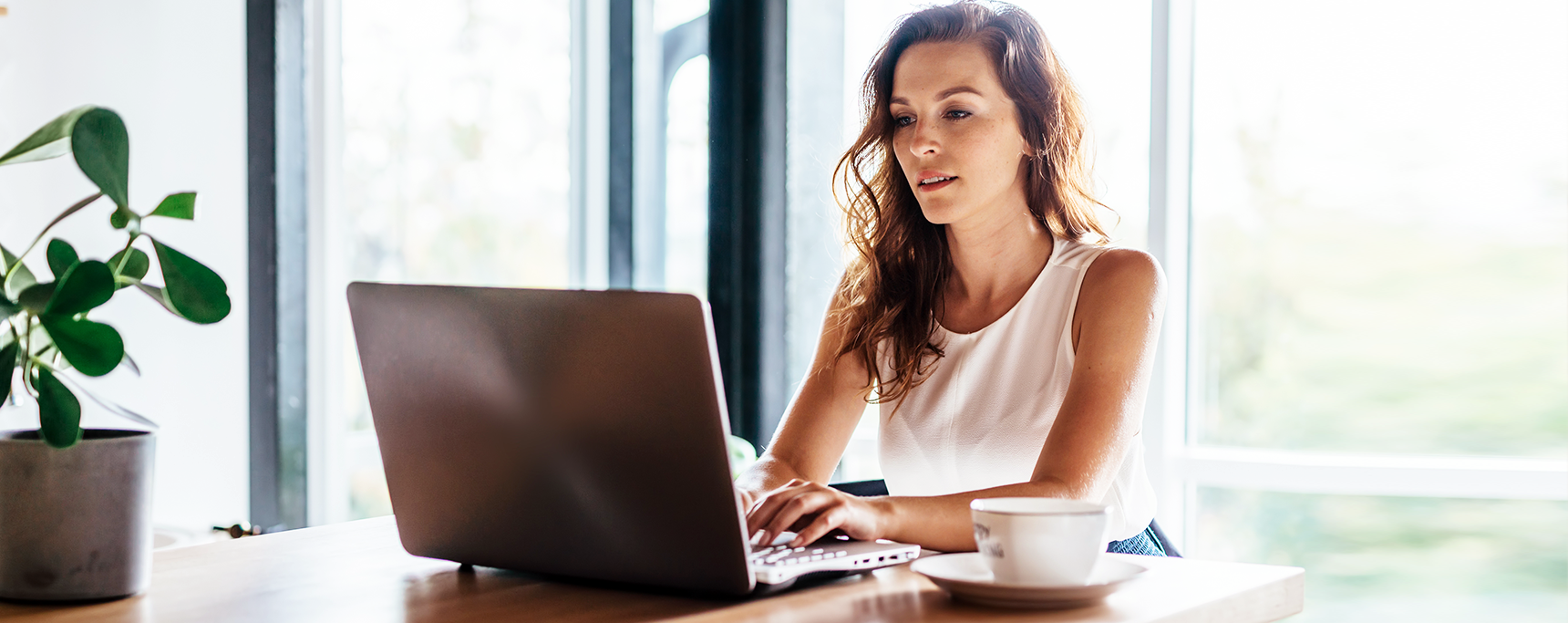 Woman on a laptop computer.